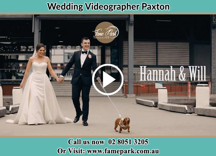 The newlyweds walking with their dog Paxton NSW 2325